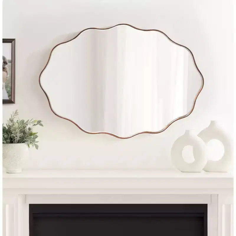 Miroir mural ovale festonné 24"x34", finition bronze