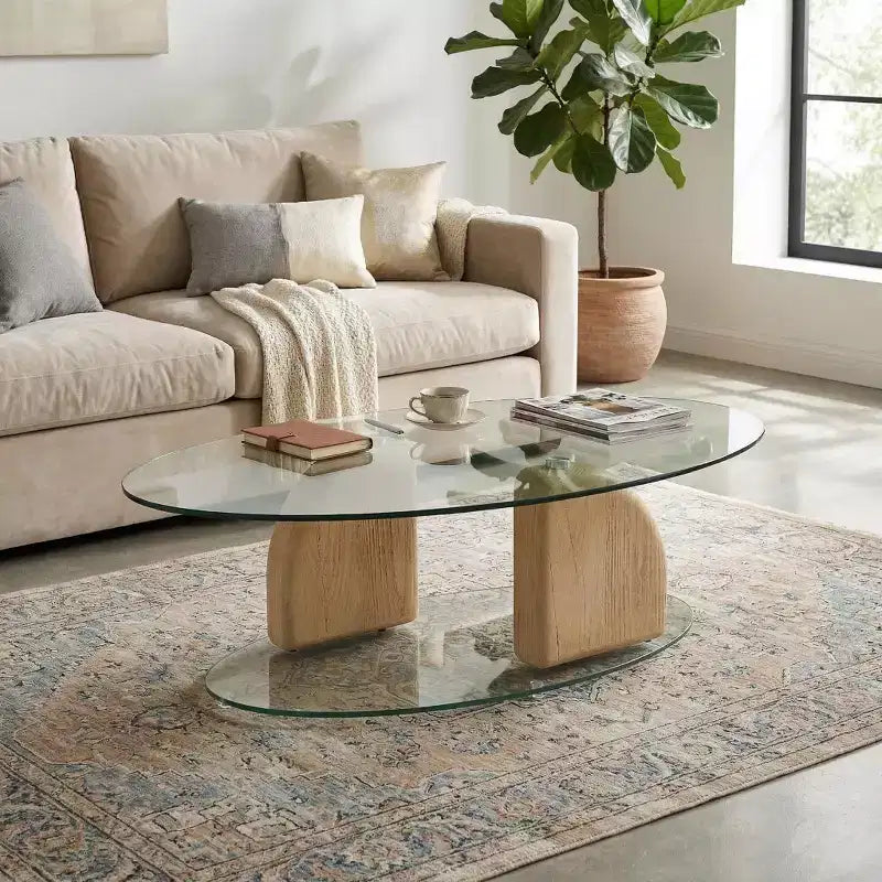 Table basse ovale moderne en verre et béton léger