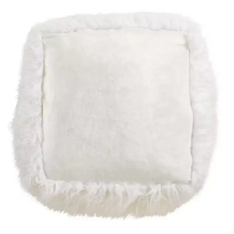 Pouf repose-pieds en fausse fourrure